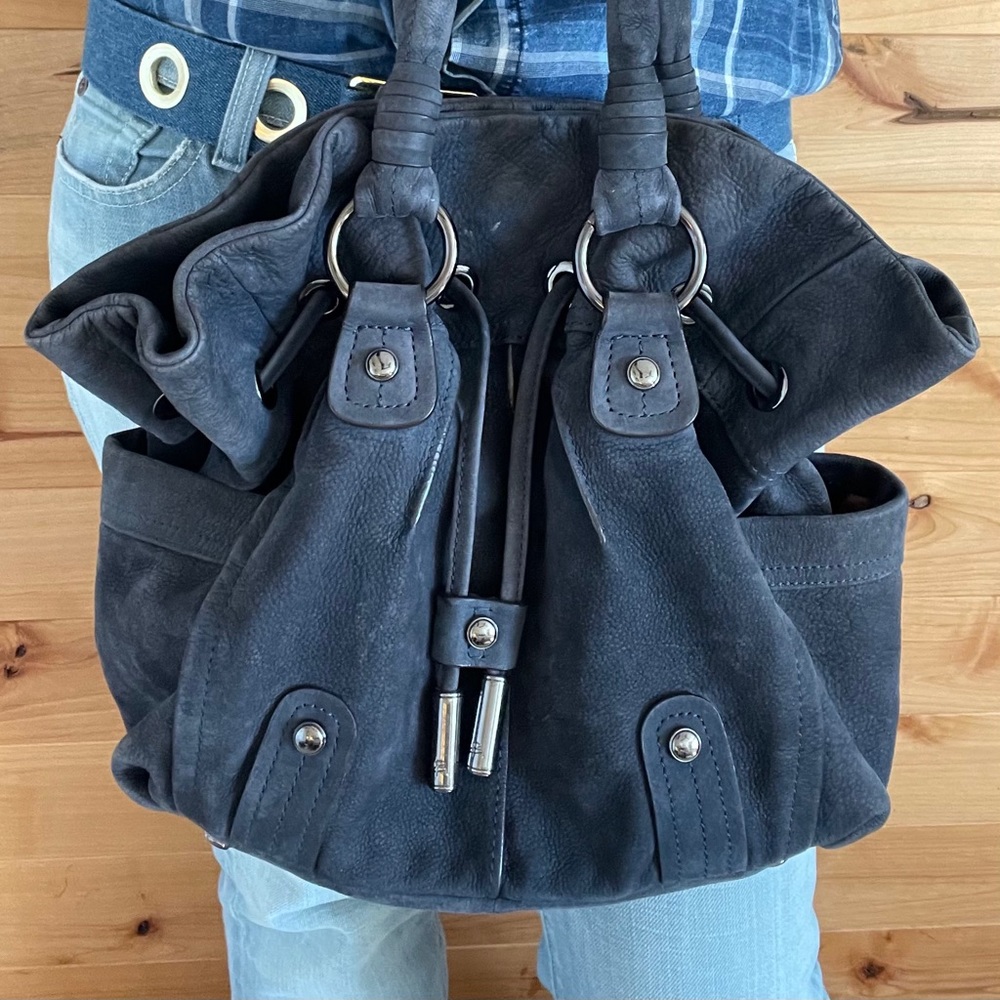 B. Makowsky blue suede boho bucket purse